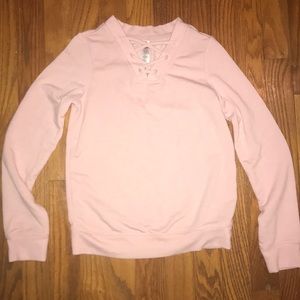 A pink long sleeved shirt